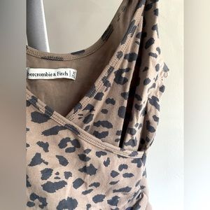 Abercrombie tan and black leopard v neck thong body suit - size XS
